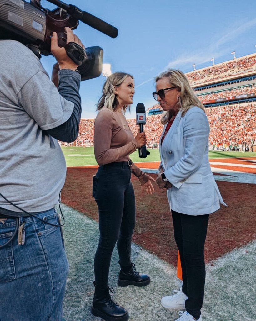 College Football Sideline Reporter Tori Petry interviews OU Softball coach Patty Gasso at the Oklahoma vs. Baylor 2022 football game. 