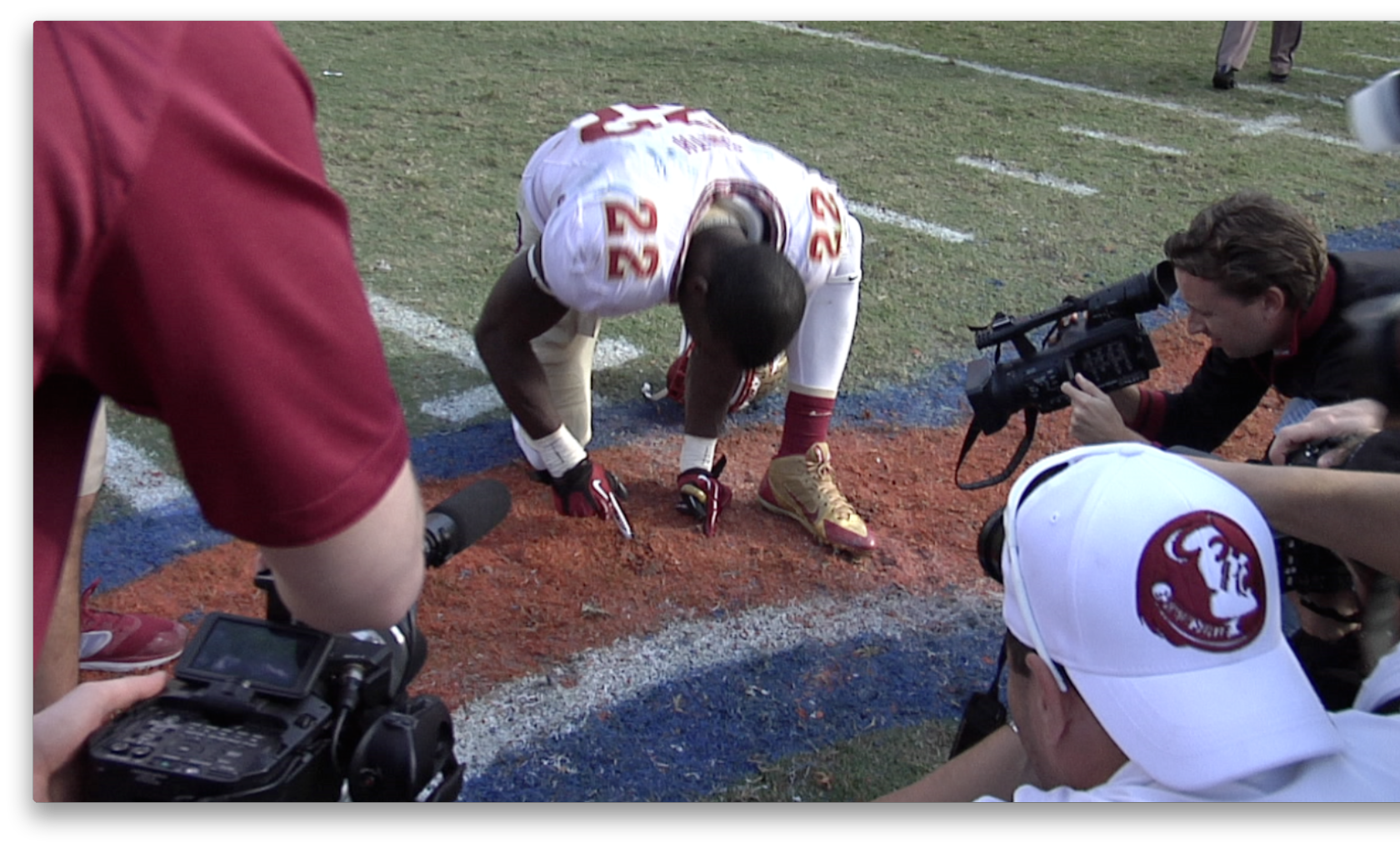 FSU player cuts turf from Florida Field while UF band plays Alma Mater